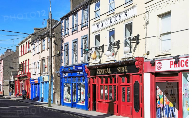 Colourful shops and pub historic high street buildings, Youghal, County Cork, Ireland, Irish Republic, Europe