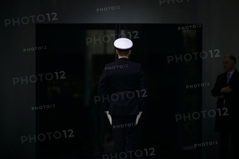 A marine stands with his back to the camera in front of the entrance to the Federal Chancellery. Berlin, 24.04.2024