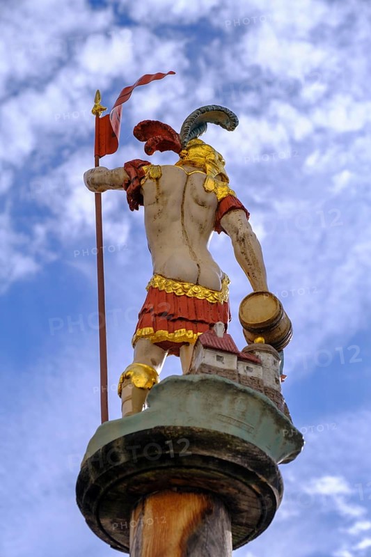 Backside, bum, bottom, St Florian, fountain figure, at Fritzplatz, Bad Tölz, Upper Bavaria, Bavaria, Germany, Europe