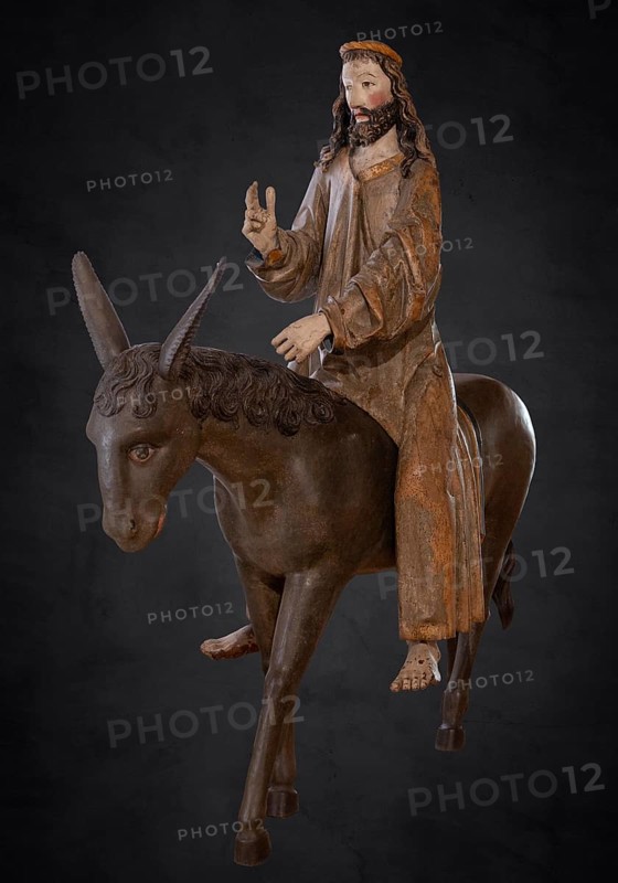 Palm tree donkey, wooden figure from 1470, on a dark background, Franciscan Museum, Villingen, Baden-Württemberg, Germany, Europe