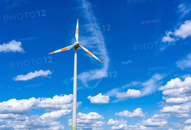 Wind turbine, wind energy plant from the manufacturer Enercon, blue sky with many white clouds, near Schermbeck, North Rhine-Westphalia, Germany, Europe