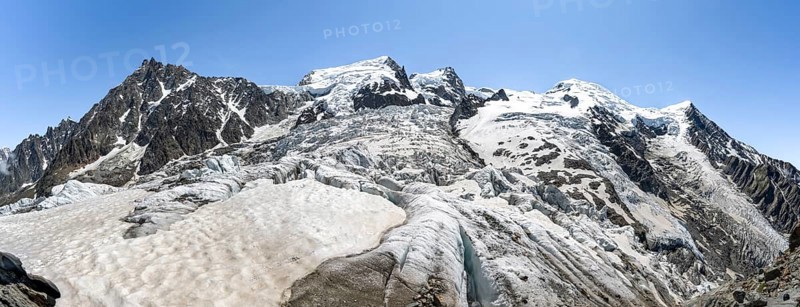 High alpine glaciated mountain landscape, La Jonction, Glacier des Bossons meets Glacier de Taconnaz, summit of Aiguille du Midi, Mont Maudit and Mont Blanc, Chamonix, Haute-Savoie, France, Europe
