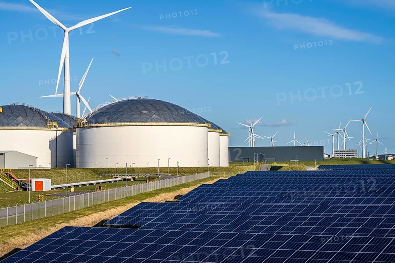 Vopak Solarpark Eemshaven, 19 hectares of solar modules with a capacity of 25 megawatts, around the Vopak tank terminal in the industrial harbour of Eemshaven, wind farm, Groningen, Netherlands