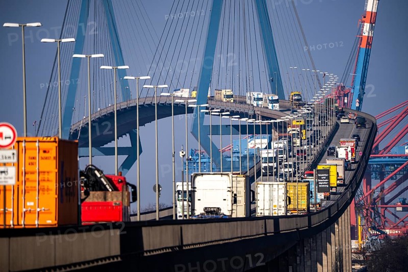 Traffic on the Köhlbrand Bridge in the port of Hamburg, spans the 325 m wide Köhlbrand, an arm of the Süderelbe, the bridge is over 3600 metres long, 53 metres above the water, piers 135 m high, more than 30, 000 vehicles use the B3 bridge daily, important connection to the port, it is dilapidated, to be rebuilt, Hamburg, Germany, Europe