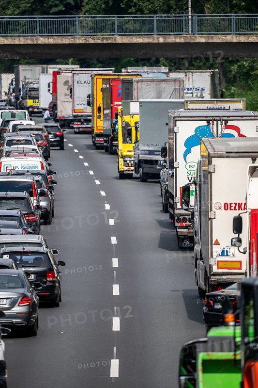 Traffic jam on the A40 motorway, near Mülheim-Winkhausen, in the direction of Duisburg, after an accident, vehicles form a rescue lane, North Rhine-Westphalia, Germany, Europe