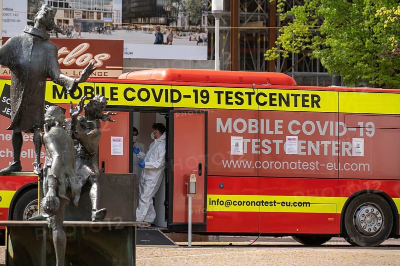 Mobile test centre for Corona rapid tests, in a bus, in the city centre of Bochum, North Rhine-Westphalia, Germany, Europe