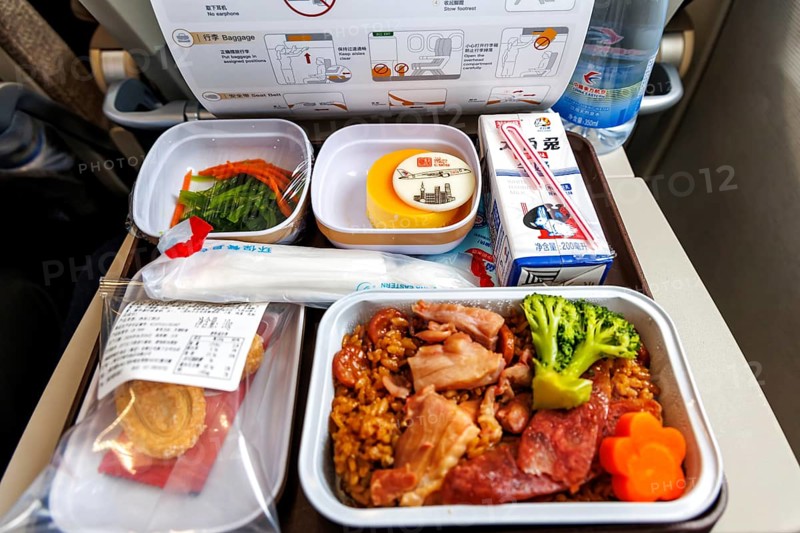 Aeroplane meal in the COMAC C919 aircraft of China Eastern with the registration number B-919F at Hongqiao Airport (SHA) in Shanghai, China, Asia