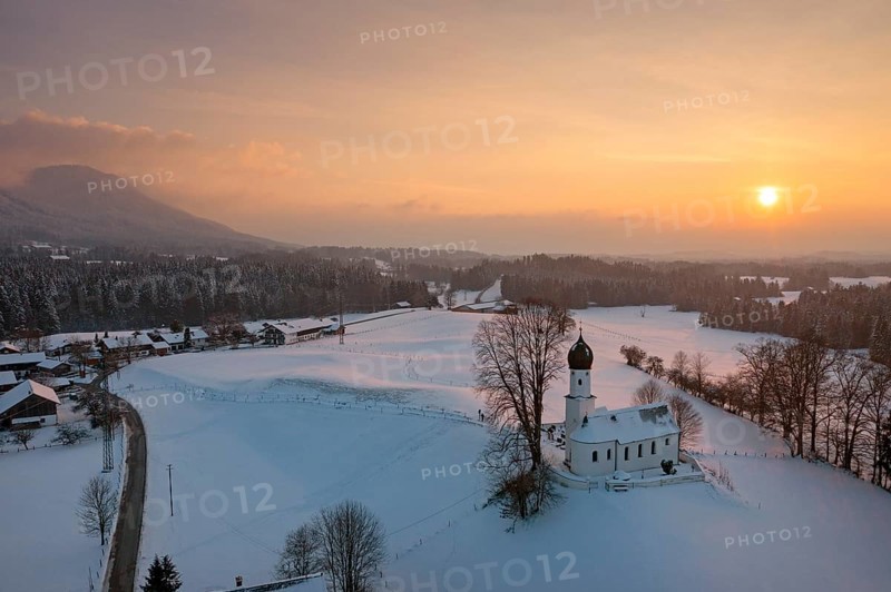 Sunset, Church of the Visitation of the Virgin Mary in winter, Oberbuchen, drone shot, Tölzer Land, Upper Bavaria, Bavaria, Germany, Europe
