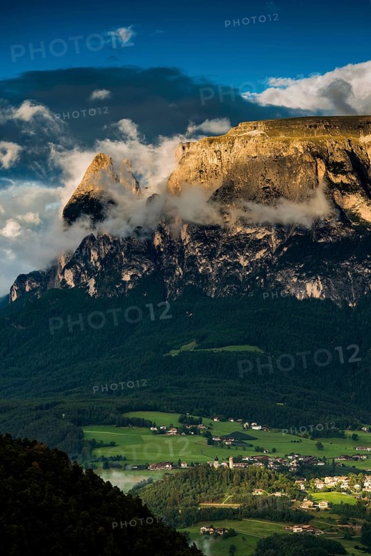 Sunset and mountain peaks in the clouds, Catinaccio, Dolomites, South Tyrol, Trentino-Alto Adige, Italy, Europe