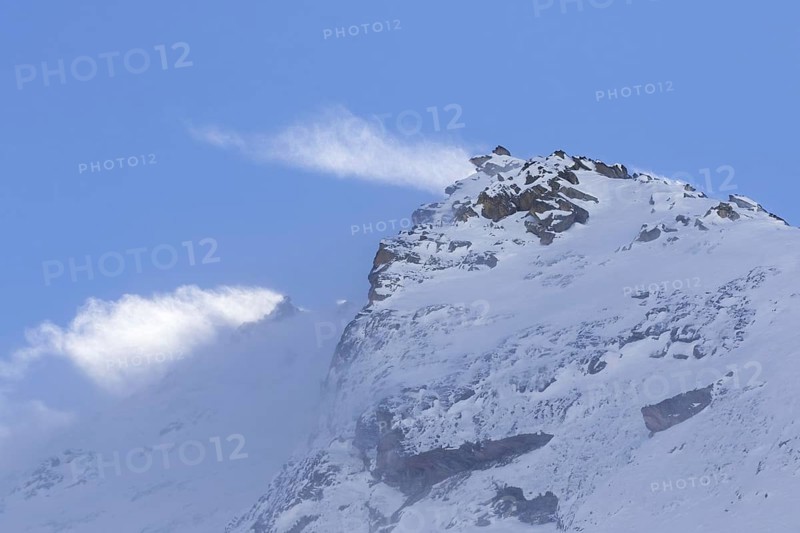 Snow covered mountain top, pinnacle Cima dell'Arolley in winter in the Gran Paradiso Massif of the Graian Alps, Aosta Valley, Italy, Europe