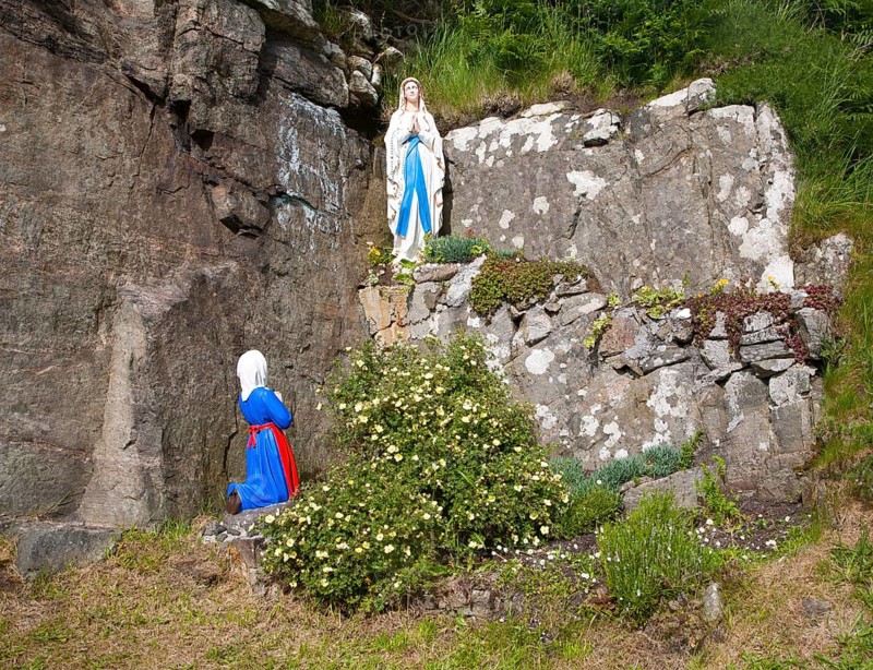 Madonna statue in rocky grotto at Northbay, Barra, Outer Hebrides, Scotland, UK