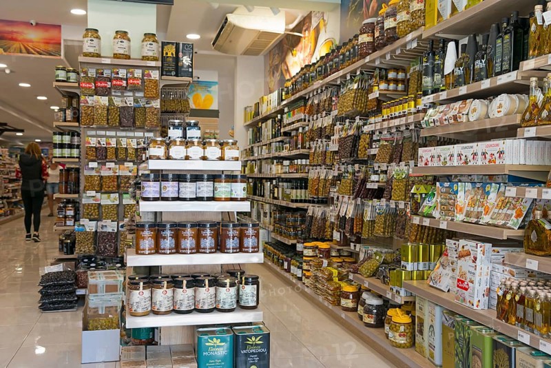 View into a grocery shop with well-stocked shelves full of products, Ouranoupoli, City of Heaven, Athos Peninsula, Halkidiki, Greece, Europe