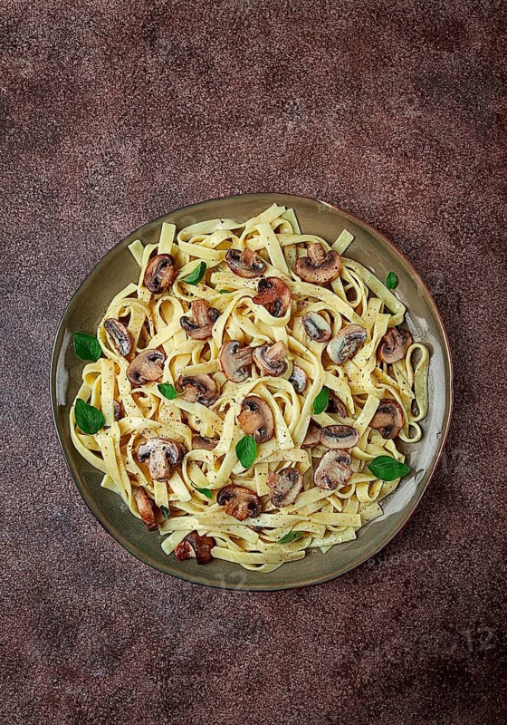 Fettuccine with champignons, basil, in cream sauce, homemade, no people