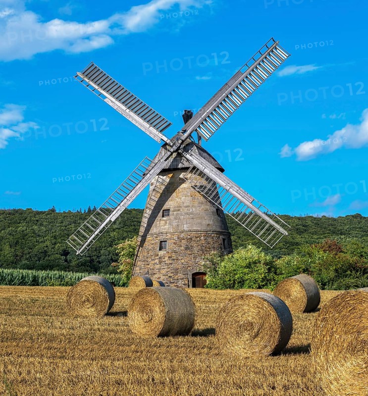 Historic windmill with straw bales Eisbergen Porta Westfalica Germany