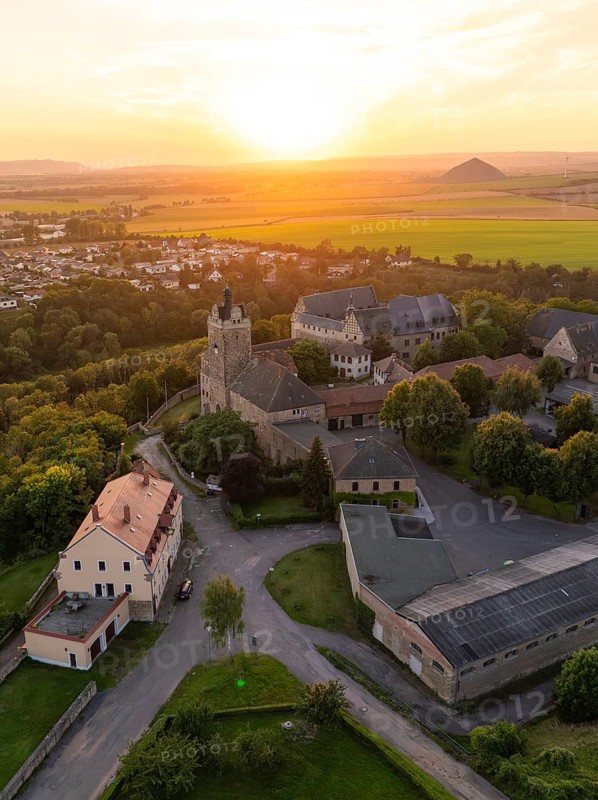 Aerial view of a castle at sunset, with a village and scenic background, Allstedt, Harz, Germany, Europe