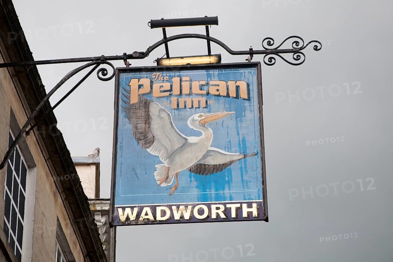 Pub sign for Wadworth beer at the Pelican Inn, Devizes, Wiltshire, England, United Kingdom, Europe