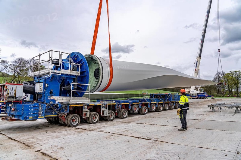 Preparation for the transport of a 68 metre long blade, a wind turbine, with a self-propelled Blade-Lifter vehicle, over a 40 km long route in the Bergisches Land, through towns, villages, over country roads, narrow through roads, to the construction site of the wind turbine near Hagen, North Rhine-Westphalia, Germany, Europe
