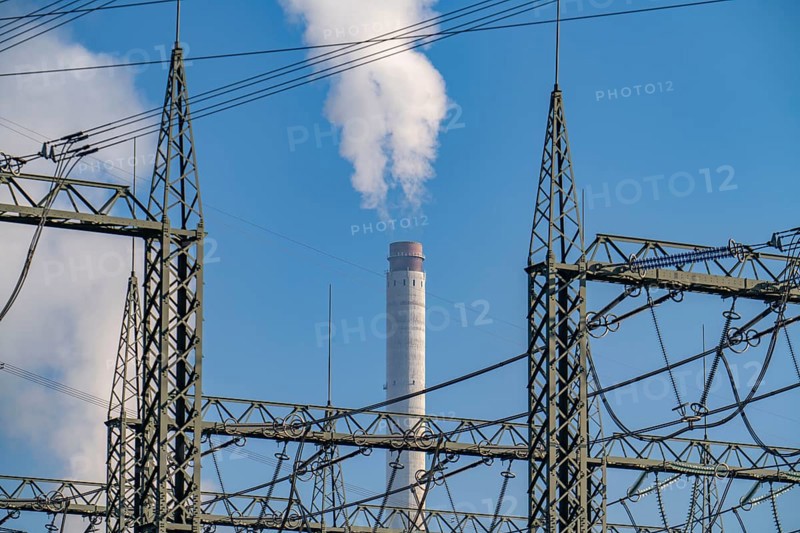 380 kV system, switchgear, from transmission system operator Amprion, in the Emscherbruch in Herten, chimney of the STEAG combined heat and power plant in Herne, North Rhine-Westphalia, Germany, Europe