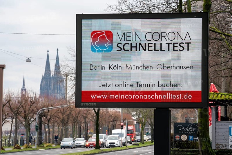 LED billboard, with digital advertising for Corona rapid tests, in the test centre in Cologne, on Konrad-Adenauer-Ufer in Cologne, North Rhine-Westphalia, Germany, Europe