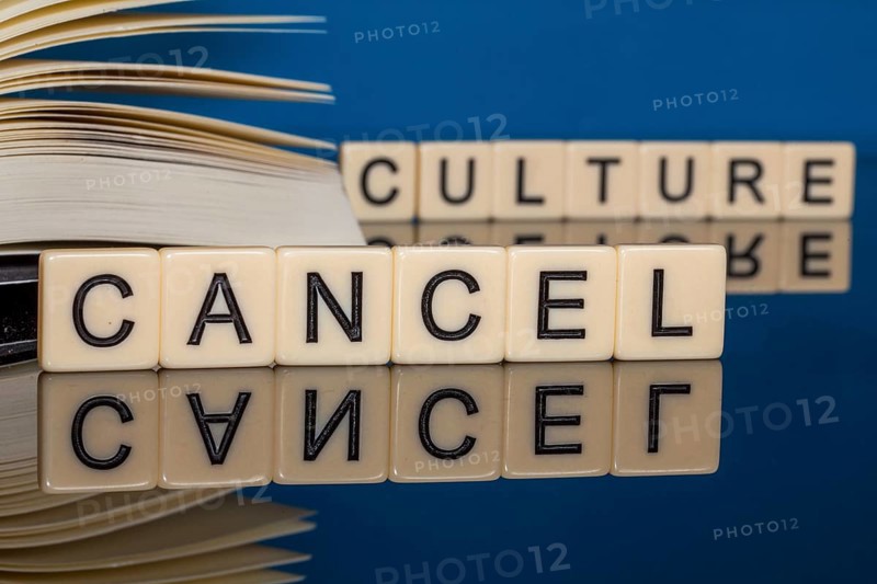 Symbolic image Cancel Culture: Letter cubes show the words Cancel Culture in front of a book