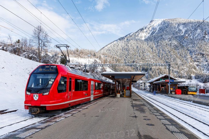 Rhaetian Railway train on the Albula railway Stadler Rail Capricorn passenger train at Filisur station, Switzerland, Europe