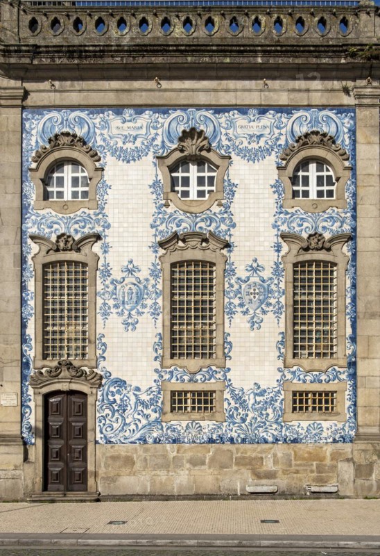 The facade of Igreja do Carmo church, adorned with intricate blue and white tiles, Porto, Portugal, Europe
