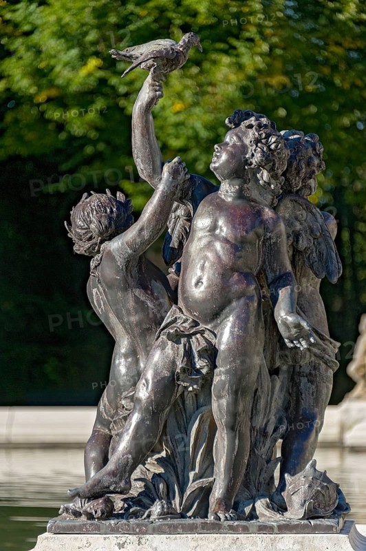 Putti, figures at the edge of the Fama Fountain, Fama Fountain, fountain, fountain, water parterre, New Herrenchiemsee Palace, palace park, Herreninsel, Chiemsee, Chiemgau, Upper Bavaria, Bavaria, Germany, Europe
