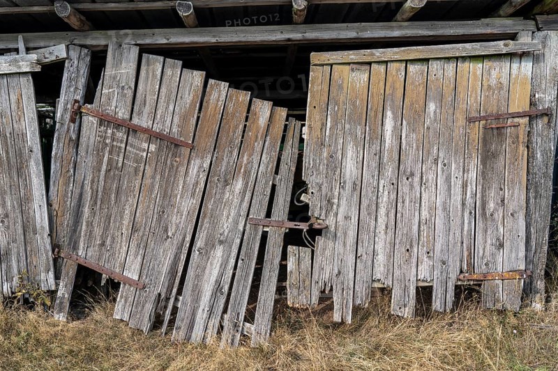 Old, rotten, dilapidated, broken barn door, in the Arnsberg Forest, Sauerland, North Rhine-Westphalia, Germany, Europe