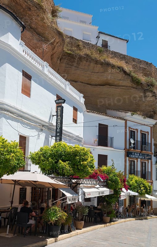 Street in Setenil de las Bodegas with restaurants and shops under rocks, cave dwellings, Setenil de las Bodegas, Cadiz, Andalusia, Spain, Europe
