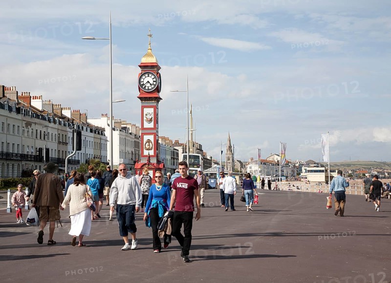 The Jubilee clock tower seafront promenade Weymouth, Dorset, England, UK built 1887 to celebrate the Jubilee of Queen Victoria