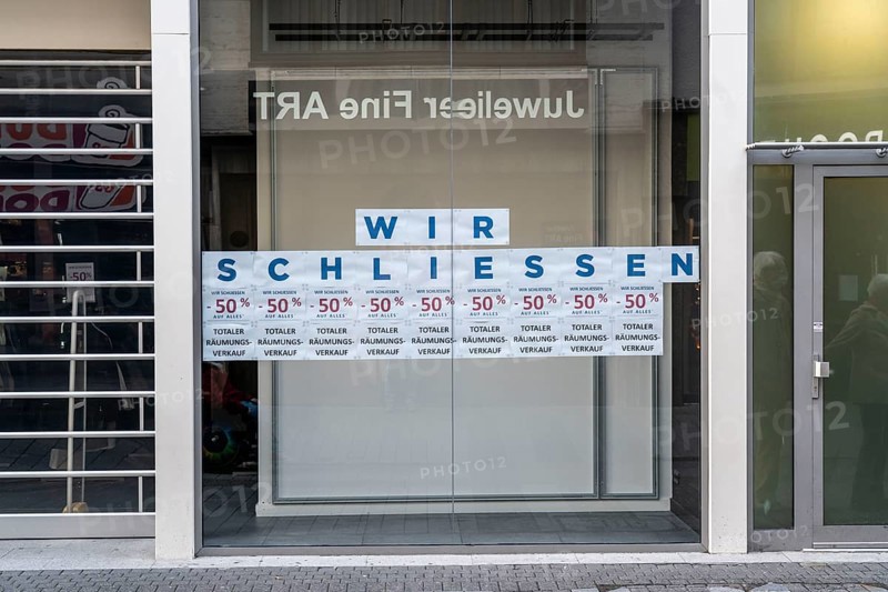 First day of the Christmas lockdown in the Corona crisis, Hohe Straße shopping street in the city centre, clearance sale, shop closures, closed shops, hardly any passers-by, in Cologne, North Rhine-Westphalia, Germany, Europe