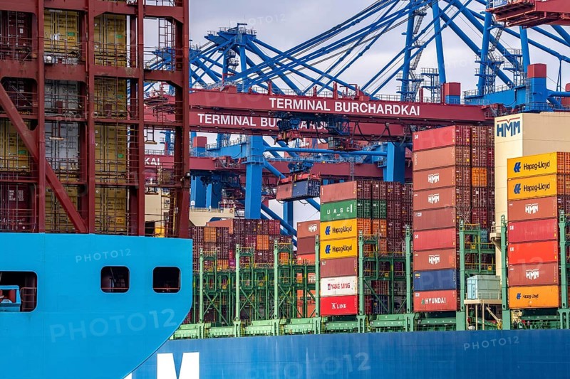 Magleby Maersk container freighter at EUROGATE Container Terminal, Waltershofer Hafen, one of the largest container ships in the world, capacity of 18, 270 TEU, Triple E class, HMM Nuri container freighter, at HHLA Container Terminal Burchardkai, capacity of up to 16000 TEU, Hamburg, Germany, Europe