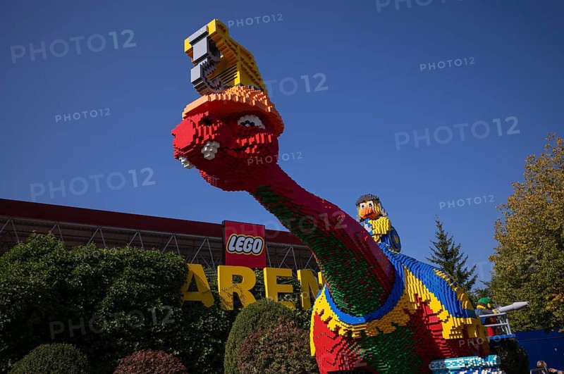 Dinosaurs in front of LEGO Arena, LEGOLAND theme park, Germany, Logo, Günzburg, Bavaria, Germany, Europe