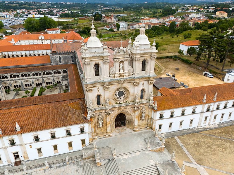 The picture shows a historic monastery with baroque architecture in an urban landscape, aerial view, Mosteiro de Alcobaça Monastery, Alcobaca, Oeste, Centro, Portugal, Europe