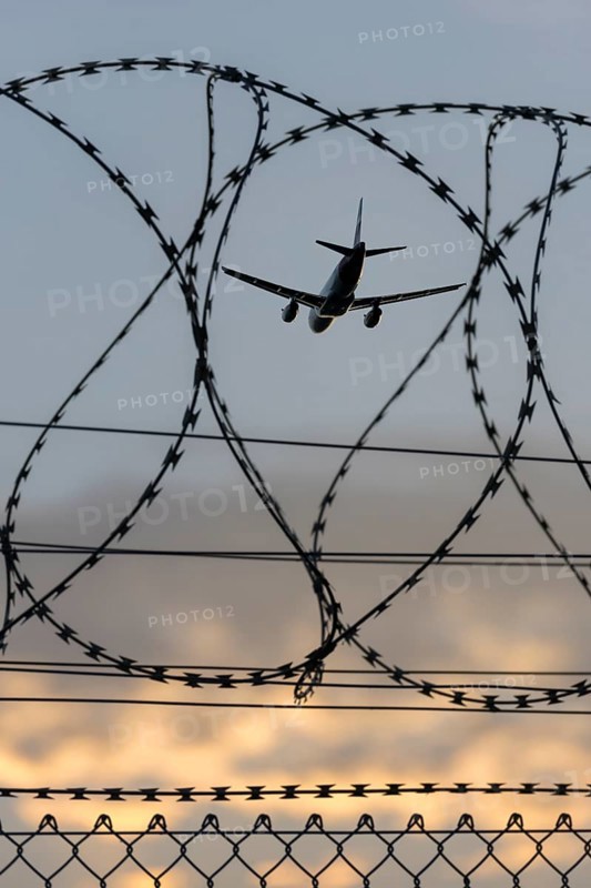 Symbolic image security, passenger aircraft taking off, security fence, Stuttgart Airport, Baden-Württemberg, Germany, Europe