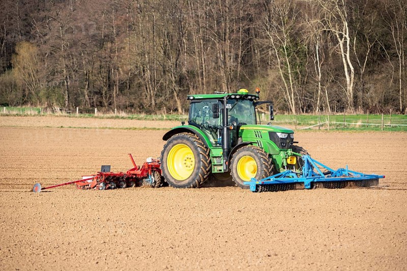 Sugar beet being sown in spring, precision sowing with precision seed drill, behind a tractor, Niederkrüchten, North Rhine-Westphalia, Germany, Europe