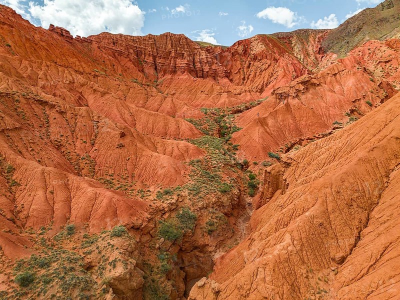 Eroded mountain landscape, canyon with red and orange rock formations, aerial view, Konorchek Canyon, Chuy, Kyrgyzstan, Asia