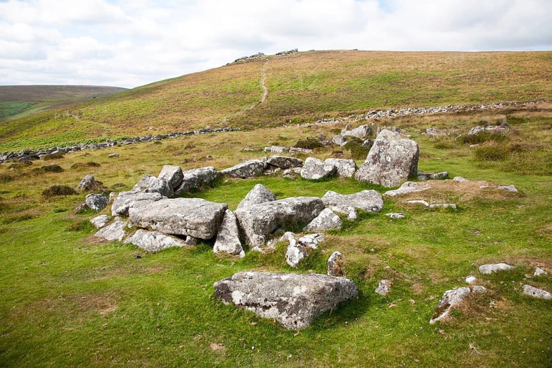 Ruins of stone hut circle in the Neolithic enlcosed area of Grimspound, Dartmoor national park, Devon, England, United Kingdom, Europe