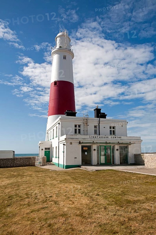 Red and white lighthouse on the coast at Portland Bill, Isle of Portland, Dorset, England, UK