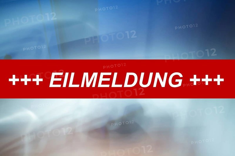 Symbolic image: The word breaking news on an abstract background