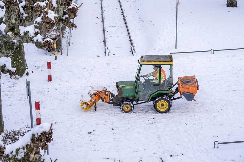 Winter onset, winter service, clearing snow and ice from pavements, sweeper, winter service tractor, Frankfurt, Hesse, Germany, Europe
