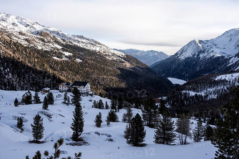Zufallhütte mountain hut, view of the Martell Valley, snow-covered mountain landscape in winter, Ortler Alps, Vinschgau Valley, Italy, Europe