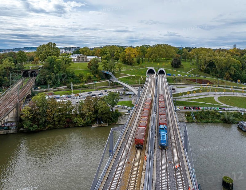 Load test on the Neckar Bridge, aerial view. Due to the unusual design, dimensional checks are mandatory in front of the bridge is opened to trains. Two goods trains weighing a total of 960 tonnes put a load on the 345-metre-long bridge over the Neckar. The bridge is part of the major Stuttgart 21 project. Rosenstein Castle and Rosenstein Park, Stuttgart, Baden-Württemberg, Germany, Europe