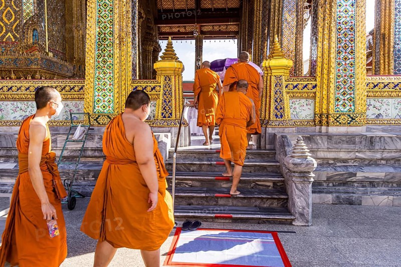 Wat Phra Kaeo temple, royal palace. Royal chapel with Buddhist monks and novices. Bangkok, Thailand, Asia