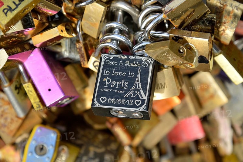 Love padlocks attached to the railing of the Pont de l'Archevêché bridge, Paris, France, Europe