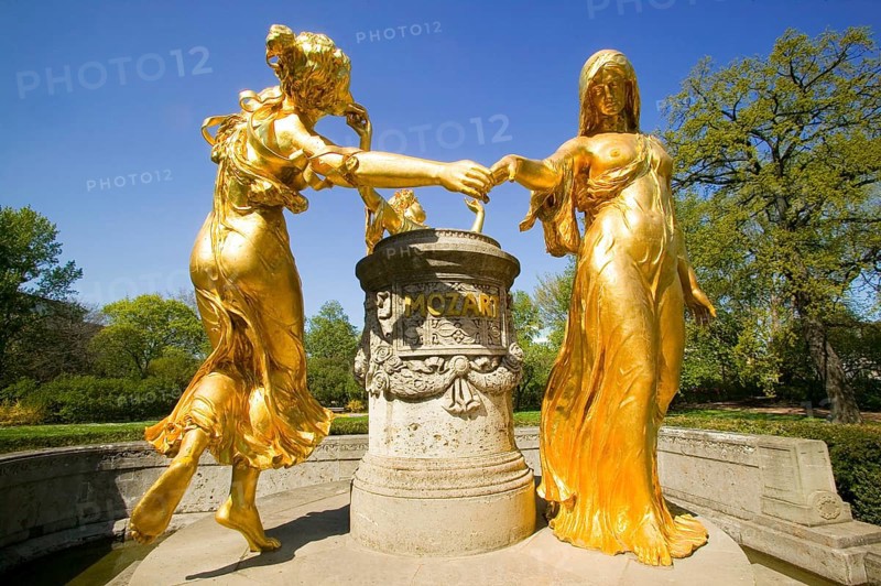 Mozart monument, the sculpture by the Berlin sculptor Hermann Hosaeus, erected in 1907, shows the three female figures dancing around the name Mozart: Heiterkeit, Ernst und Anmut. It was reinstalled in the Bürgerwiese in 1991 after extensive renovation with new gilding. see also
