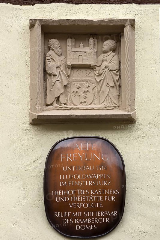 Relief with pair of donors of Bamberg Cathedral and coat of arms at the Alte Freyung, Zeil am Main, Lower Franconia, Bavaria, Germany, Europe