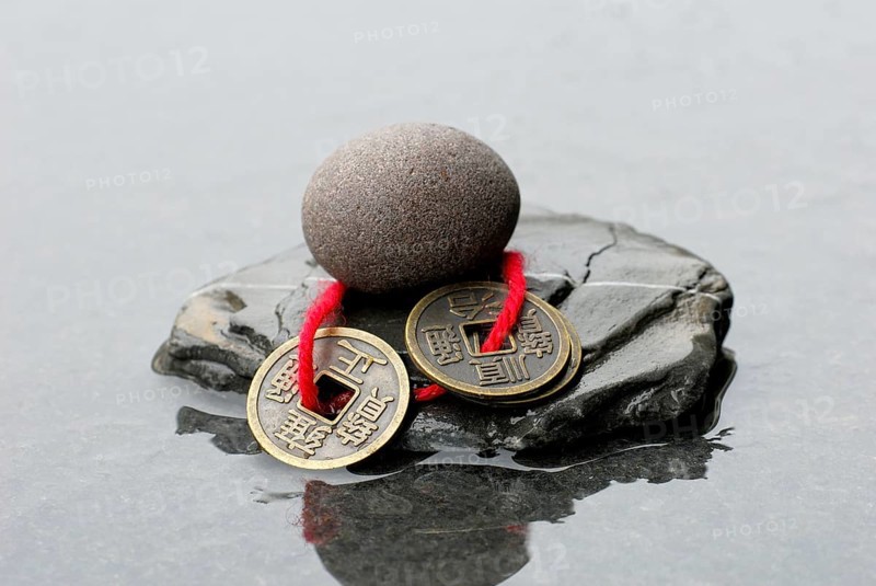 Stones and Chinese lucky coins, coins, lucky coins, lucky coin, coin, in water