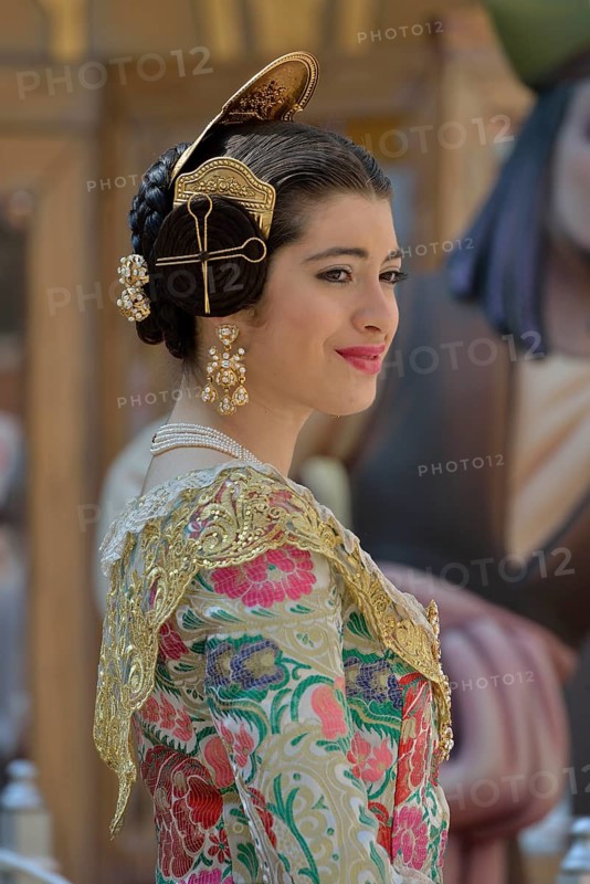 Fallas festival, woman in a traditional costume during the parade in the Plaza de la Virgen de los Desamparados, Valencia, Spain, Europe