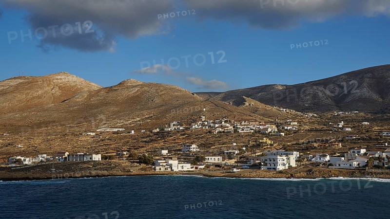 View of a coastal village with hills in the background and blue sky, Kassos Island, neighbouring island Karpathos, Dodecanese, Greek Islands, Greece, Europe